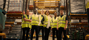 Image of warehouse team for Routeique blog on choosing a 4PL partner