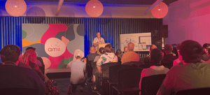 Image of Routeique CEO and Co-Founder Mike Allan speaking at Alberta Machine Intelligence Institute's Upper Bound Conference